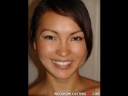 Ann-lyz is sited on a sofa, legs appart and looking at you