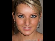 Vanessa jordin is sited on a sofa, legs appart and looking at you